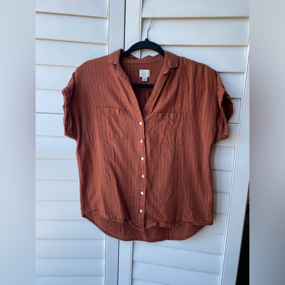 Button up top